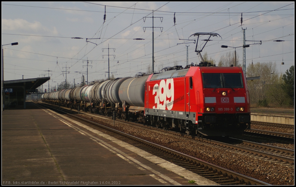 DB Schenker 185 399-3  DB Schenker und Bombardier  mit Kesselwagen (gesehen Berlin Schnefeld Flughafen 14.04.2012)