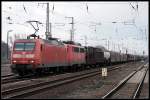 DB Schenker 145 018-8 und als Wagenlok 140 327-8 mit einem gemischtem Gterzug (Wustermark-Priort 16.03.2010)