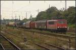 DB Schenker 155 033-4 mit einem kurzen gemischtem Güterzug am 09.09.2011 in Magdeburg Hbf