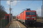 DB Regio 143 566-8 in Nuthetal-Saarmund am 25.02.2012 mit der RB22 nach Schnefeld Flughafen.