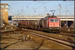 DB Schenker 155 192-8 mit einem gemischtem Gterzug am 26.02.2012 in Berlin Schnefeld-Flughafen.