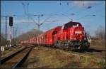 DB Schenker 261 088 mit Talns 970-Wagen am 22.02.2014 durch Leipzig-Thekla nach Chemnitz-Kchwald.