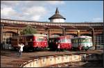 Drei Generationen Schienenbus: VT 186 258, VT 95 9396 und KWMTK 906 (ex KEG VT 2.17). Im Hintergrund lugt die Spitze des Wasserturms ber den Lokschuppen (Bw Schneweide 04.10.2009)